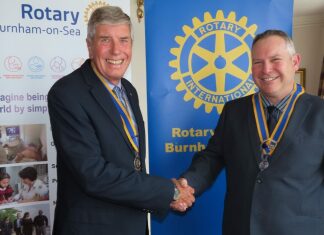Burnham-On-Sea Rotary Club President David Stickels with outgoing President Chris Ashton