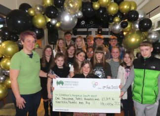 Burnham's Hillview Carnival Club presents a bumper cheque to Childrens Hospice South West