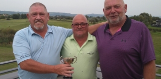 Brean Golf Club's Seniors Open Pairs winners Leighton Jenkins (left) and Chris Fairchild (right) flanking Seniors Captain Ian Rogers