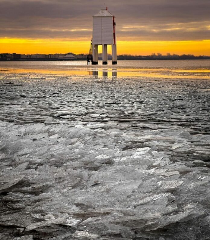 Ice forming along the tideline at sunrise in Burnham today, photographed by follower Tayler May