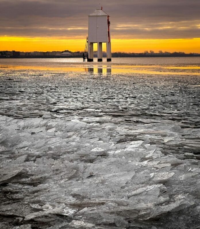 Ice forming along the tideline at sunrise in Burnham today, photographed by follower Tayler May