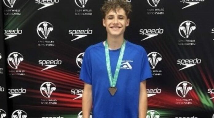 Leo Woodrow, swimmer from Burnham-On-Sea Academy Swim Team, celebrates success at Welsh Nationals