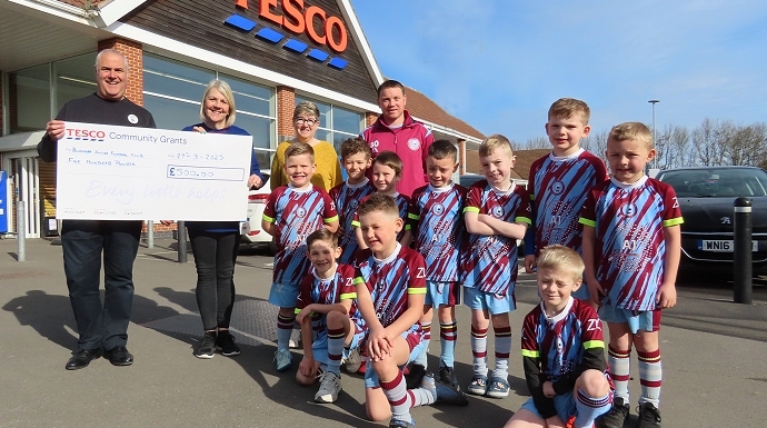A Burnham United Juniors football team is celebrating after receiving a funding boost from Tesco in Burnham-On-Sea.