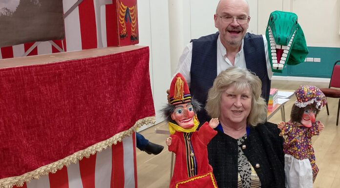Burnham-On-Sea ‘Punch and Judy artist’ Professor Paul Wheeler with Moose President Rita Harris
